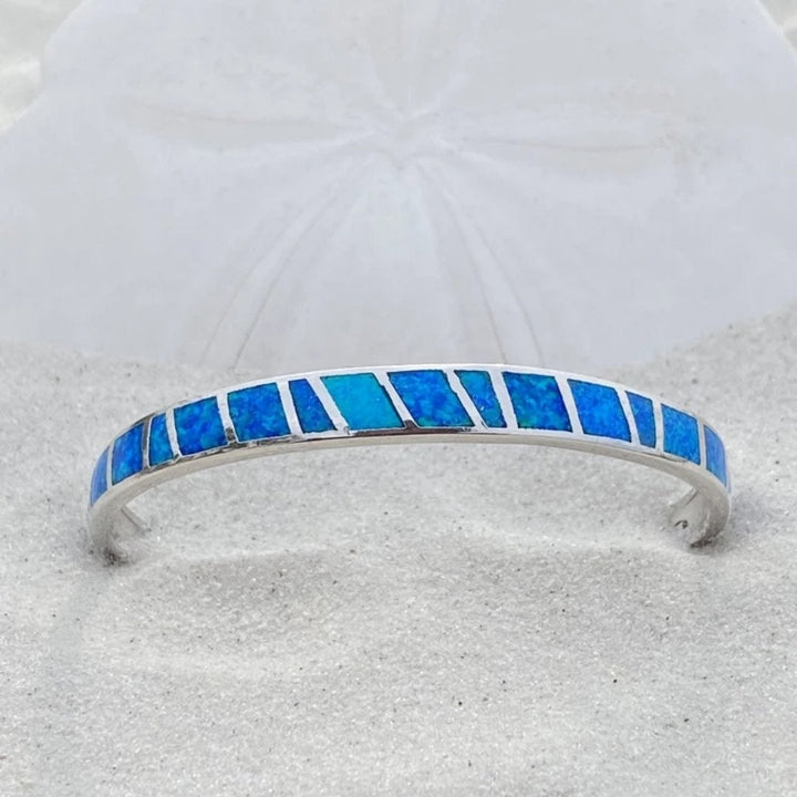 Blåt opal og sølv armbånd
