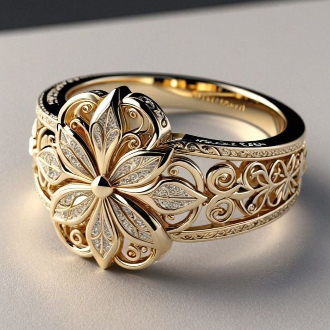 Eksotisk blomsterring i guld med zirkon