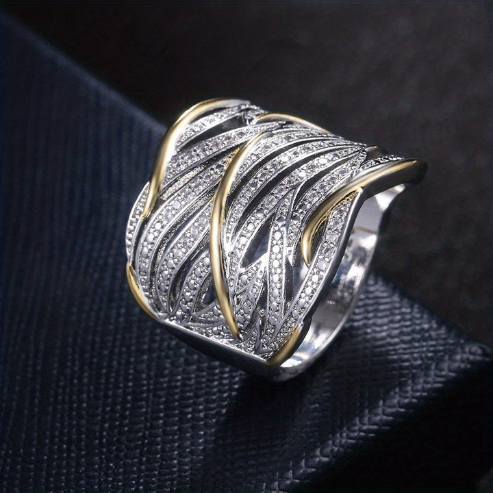 Elegant ring med snoede lag