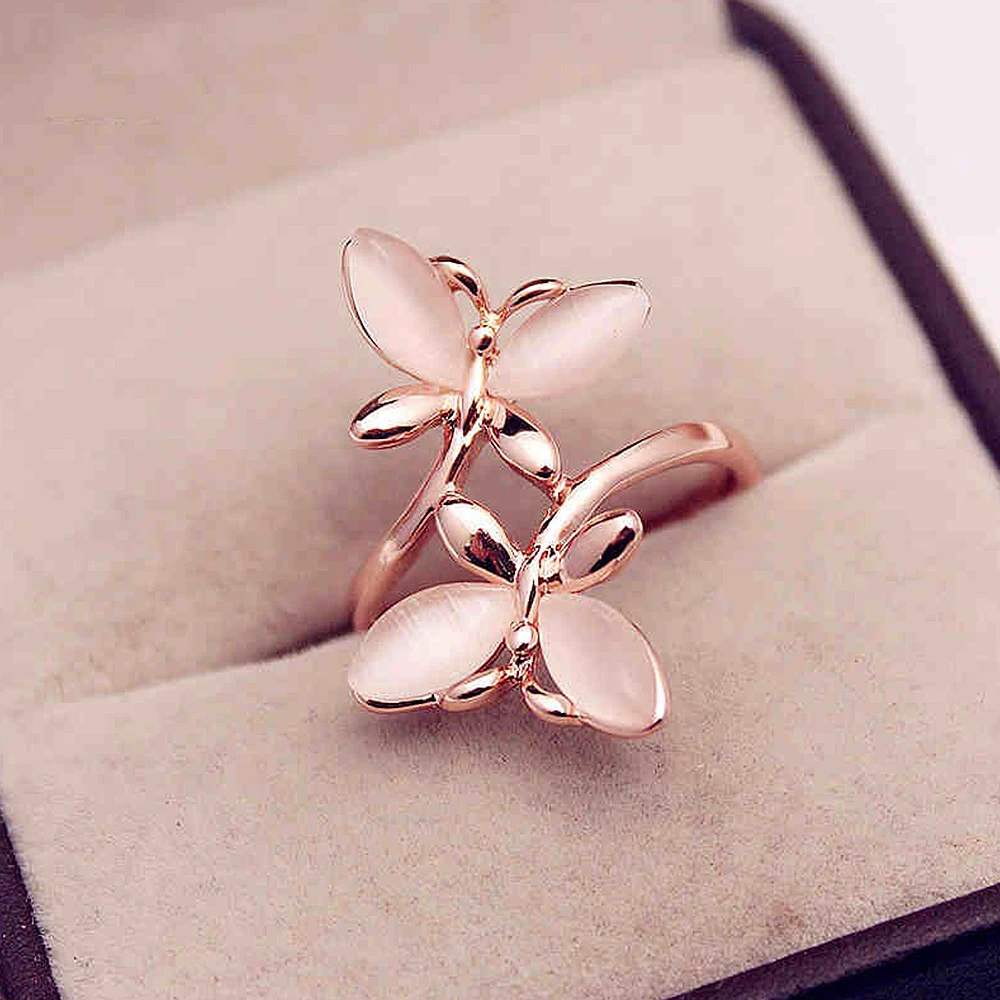 Elegant ring med blomster i rosa guld