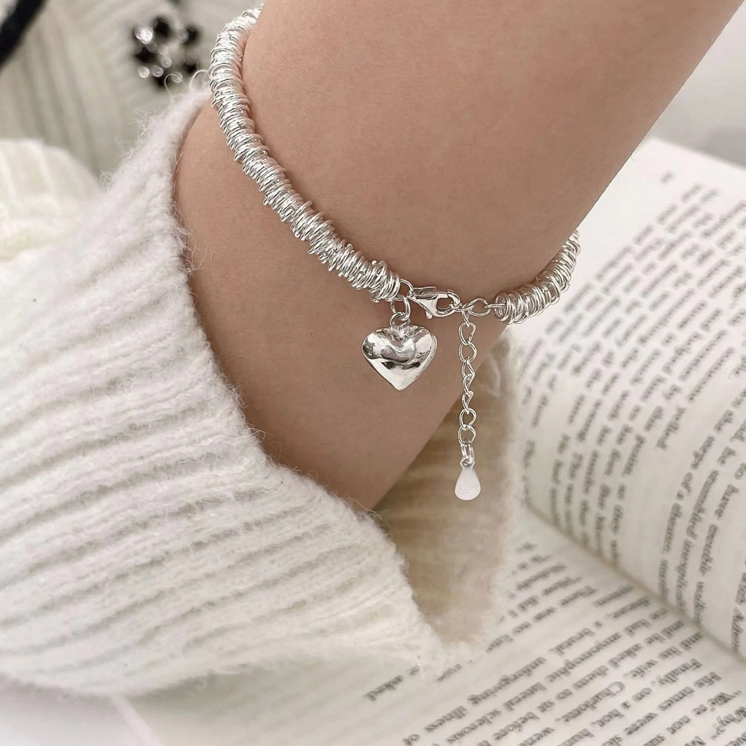 Elegantt armbånd med hjerte i sølv