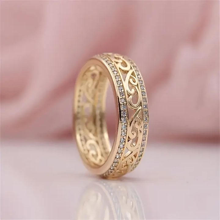 Guld, skinnende og tom ring