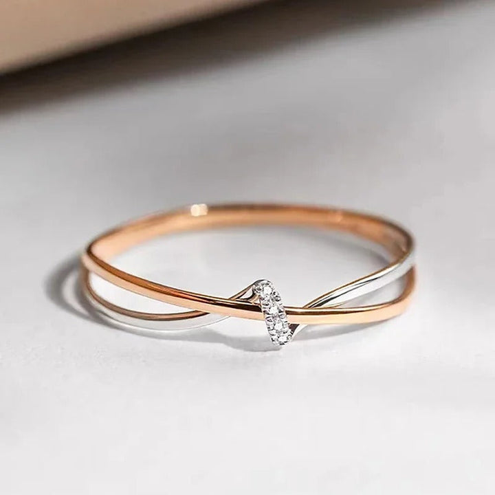Prepleten Prstan iz Rožnatega Zlata in Srebra
