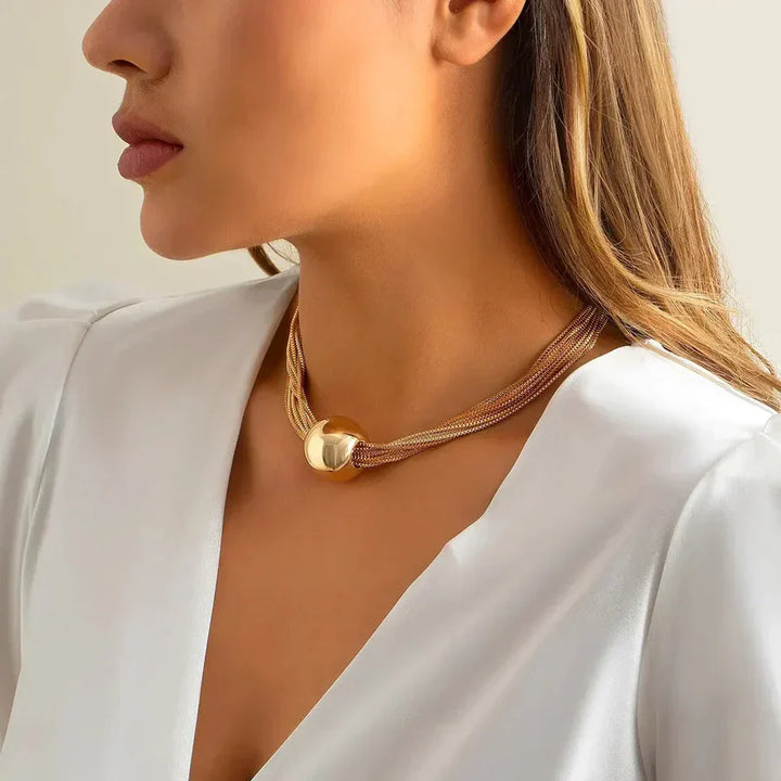 Elegant gylden krave